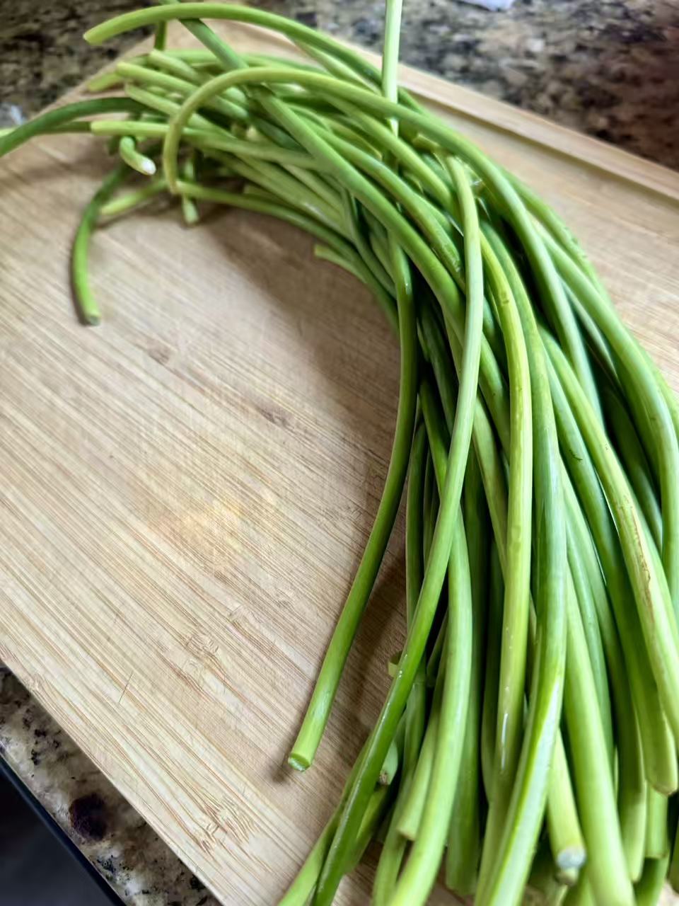 Garlic scapes, the curly flower stalks of garlic